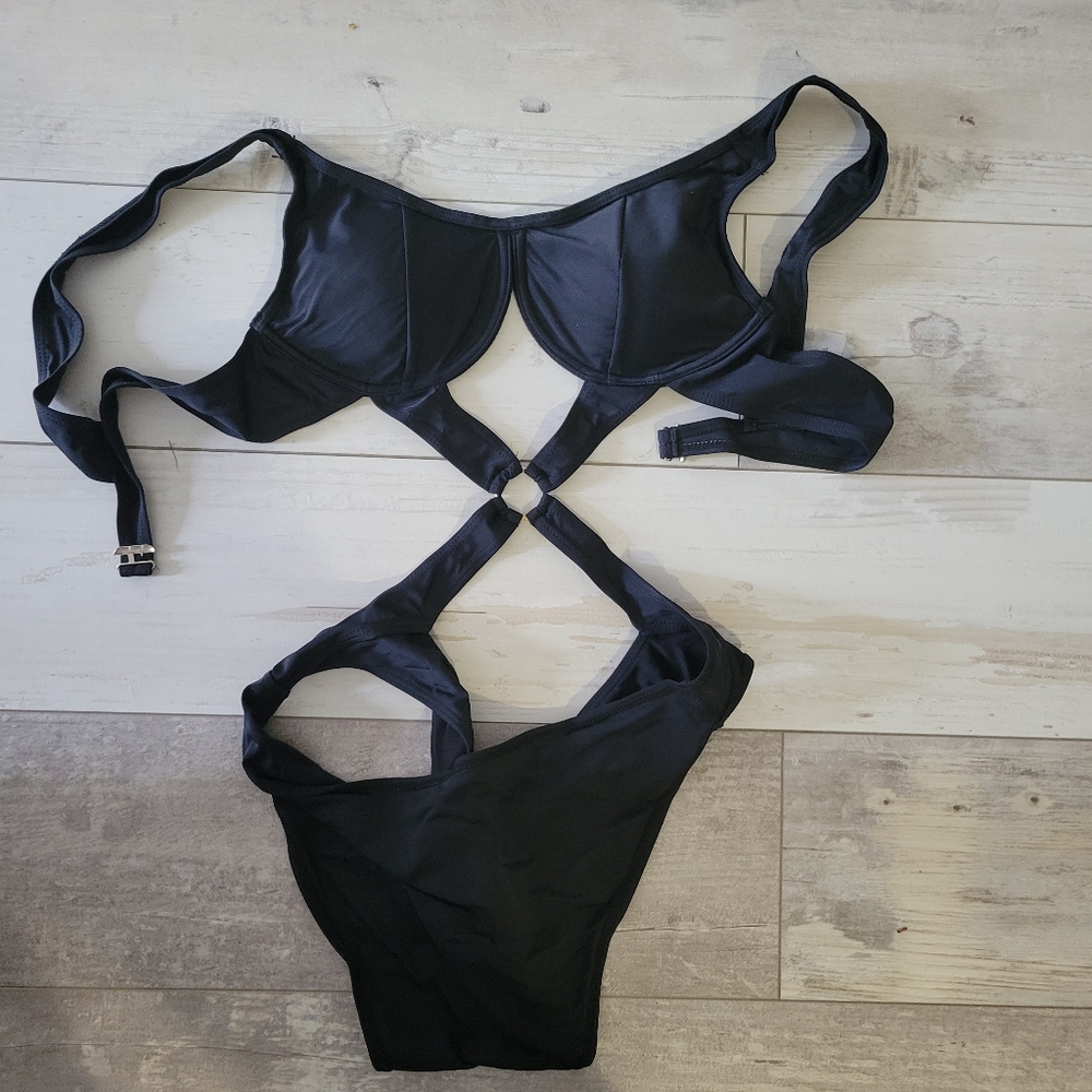 One Piece Black Bathing Suit. New never worn Size L